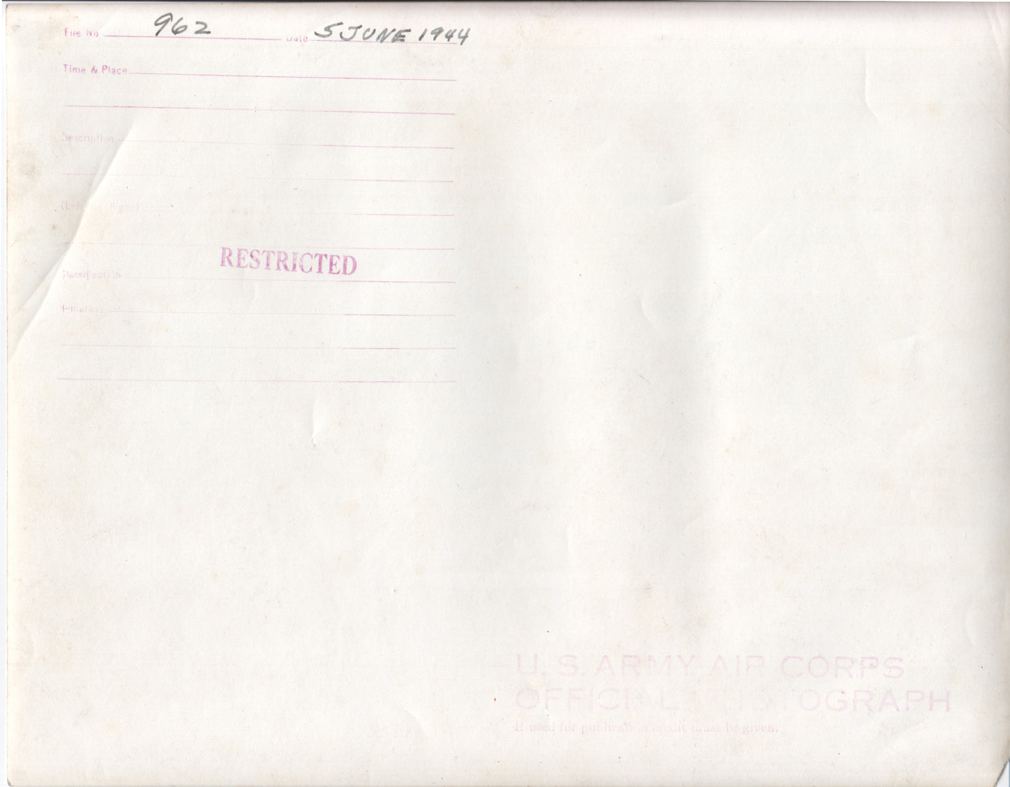 Alternate view of Historic Black and White Photo of WWII Airmen Inspecting Aircraft Plans - Vintage Military Aviation Memorabilia - Image: Folder28-26