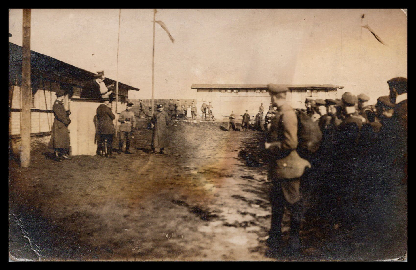 Early 20th-century military ceremony photograph in sepia tones. - Image: MA-PC_0003