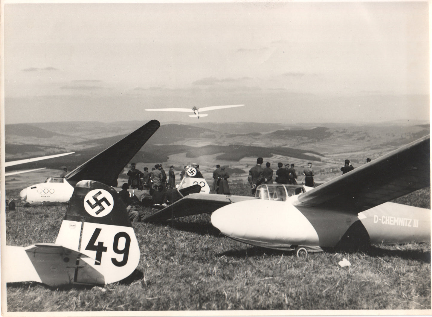 Black and white photograph of a 1930s glider airshow with historical markings. - Image: Folder15-1