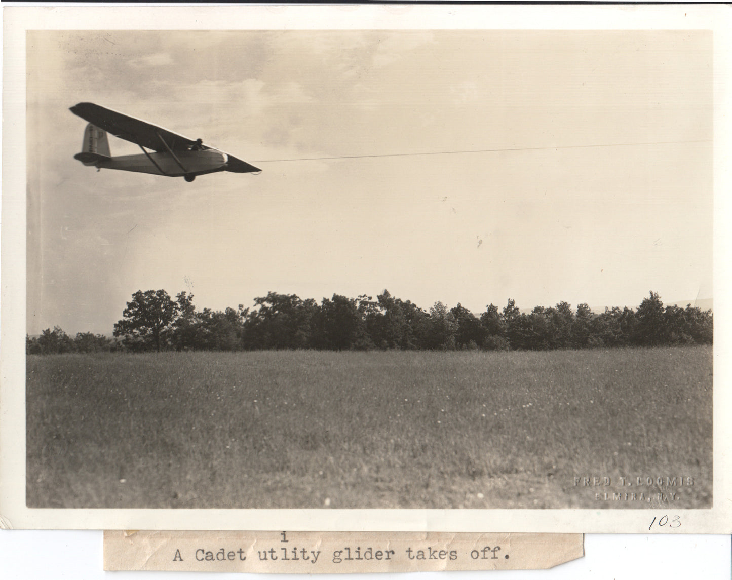 Vintage black and white photo of a Cadet utility glider taking off. - Image: Folder27-21
