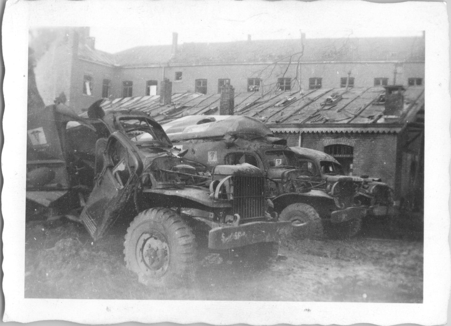 Abandoned World War II military vehicles in a dilapidated setting. - Image: 2025-08-25-0021