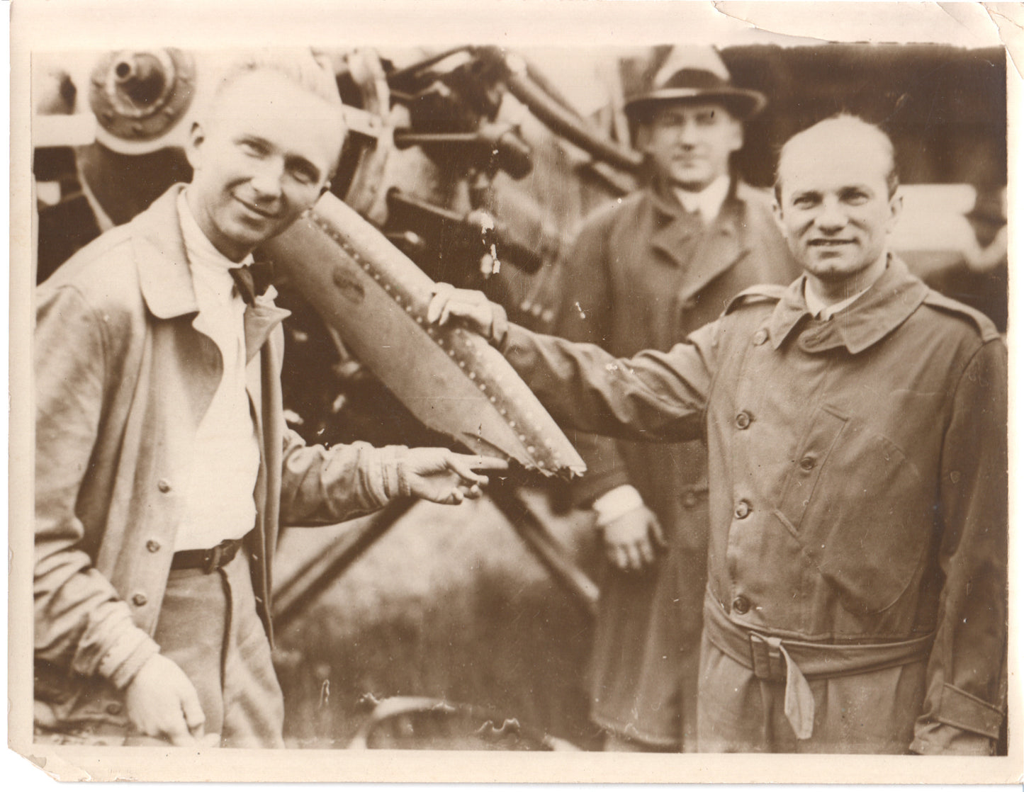 Vintage black and white photo of two men with an aircraft engine. - Image: Folder27-11