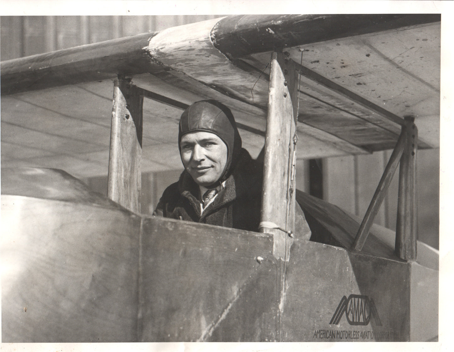 Vintage photo of a pilot in an early aircraft cockpit - Image: Folder7-3