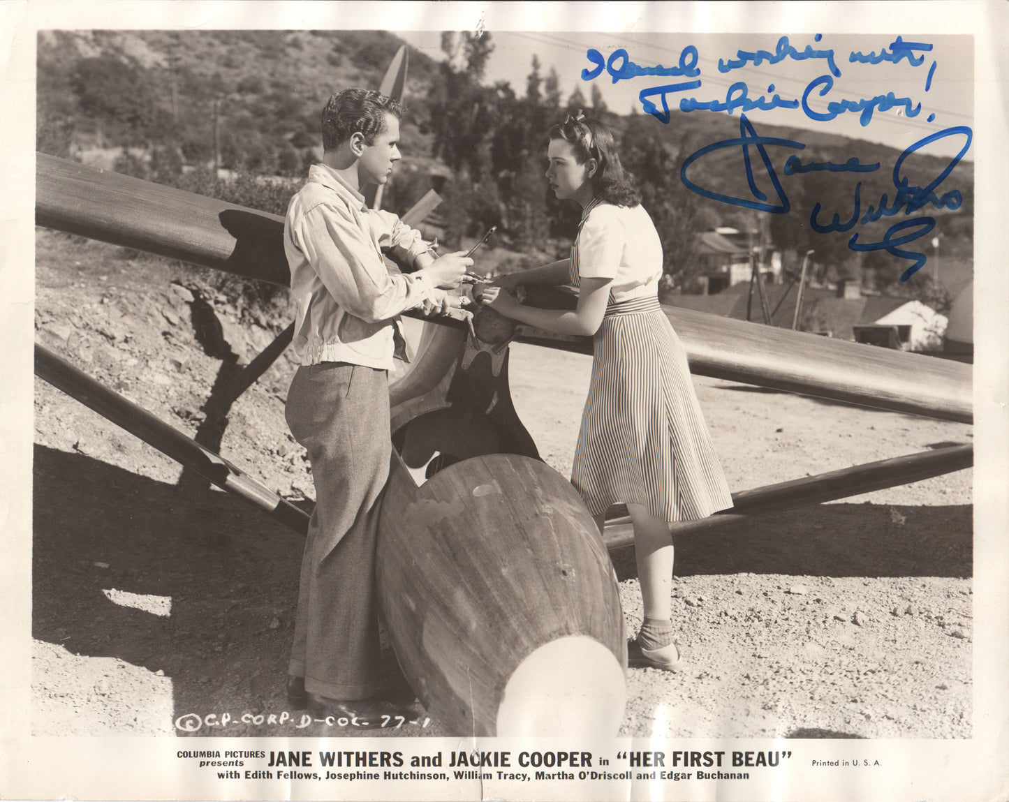 Vintage autographed photo of Jane Withers and Jackie Cooper by an aircraft - Image: Folder25-29