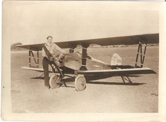 Vintage photograph of a pilot next to the "Meteorplane" biplane. - Image: Folder28-5