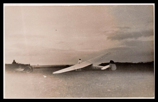 Vintage photo of a glider titled "Express & Echo" with an automobile in the background. - Image: MA-PC_0011