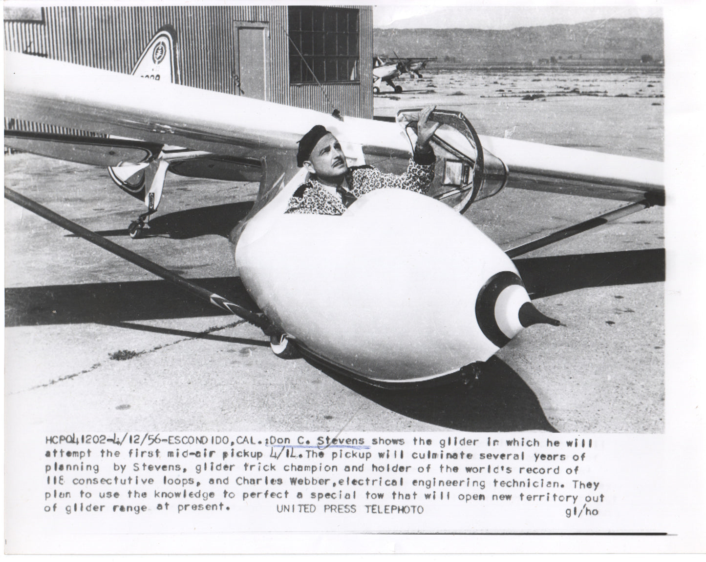 Black and white photo of glider pilot Don C. Stevens preparing for a mid-air pickup attempt in 1956. - Image: Folder14-3