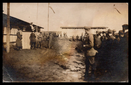 Early 20th-century military ceremony photograph in sepia tones. - Image: MA-PC_0003