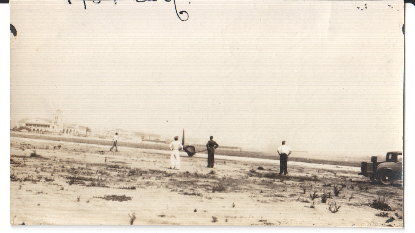 Vintage photograph of early aviation enthusiasts at an airfield. - Image: Folder9-7