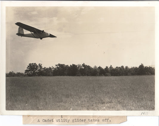 Vintage black and white photo of a Cadet utility glider taking off. - Image: Folder27-21