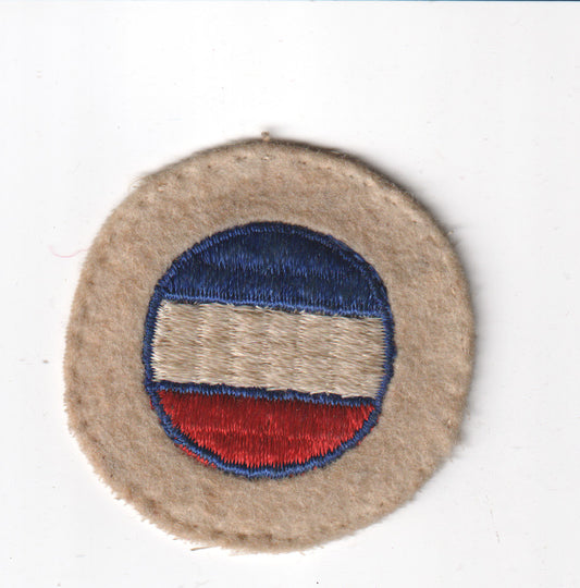 Vintage embroidered military patch with a circular design. - File: 2025-05-13-0009.jpg