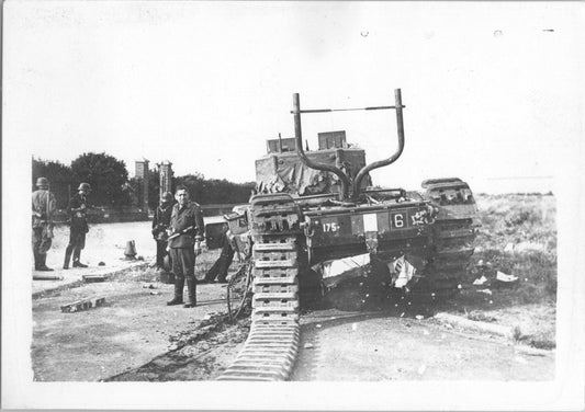 Black and white photograph of a damaged tank with soldiers during World War II - Image: 2025-08-25-0044