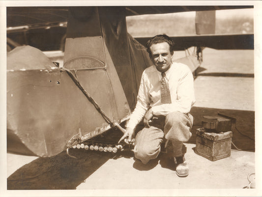 Vintage photo of a mechanic next to an early aircraft in the 1920s. - Image: Folder24-15