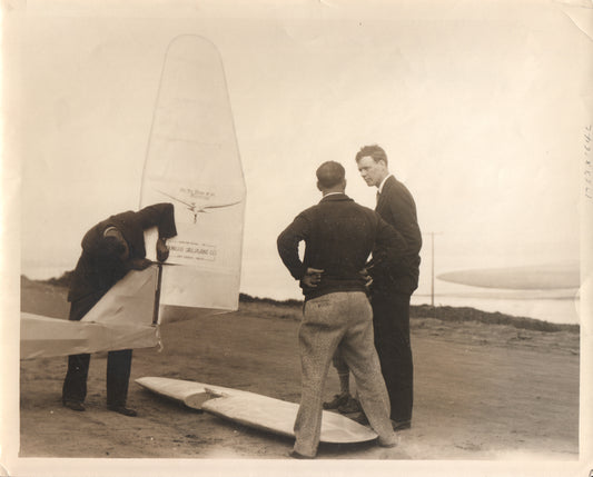 Early 1920s photograph of men examining a sailplane. - Image: Folder6-2