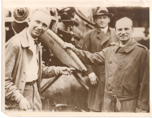 Vintage black and white photo of two men with an aircraft engine. - Image: Folder27-11