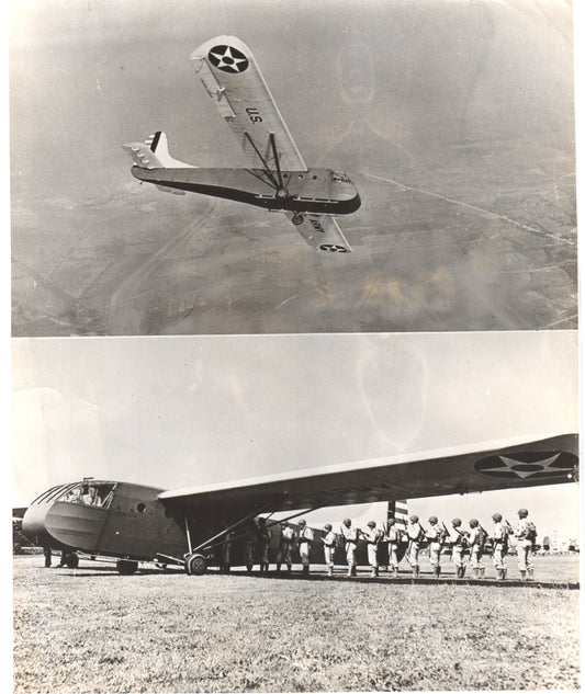 Vintage military glider in flight with soldiers lined up below. - Image: Folder14-1