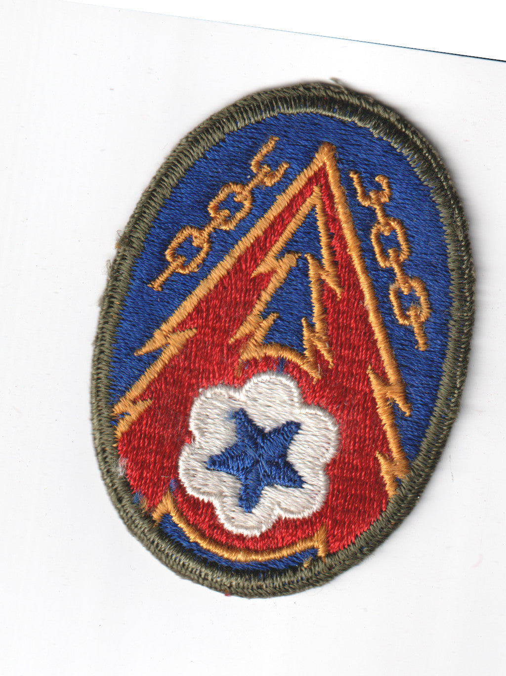 Vintage military patch featuring a red and blue design. - File: 2025-05-13-0005.jpg