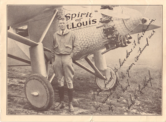 Charles Lindbergh stands next to the "Spirit of St. Louis" in a vintage photograph. - Image: Folder6-8