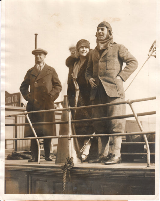 Vintage photograph of three people on a ship deck in the 1920s. - Image: Folder25-17