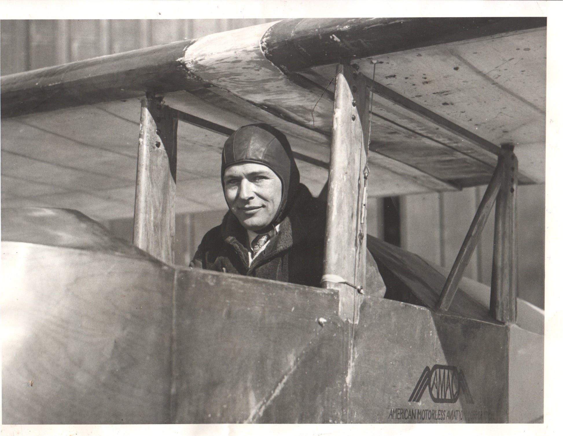 Vintage photo of a pilot in an early aircraft cockpit - Image: Folder7-3