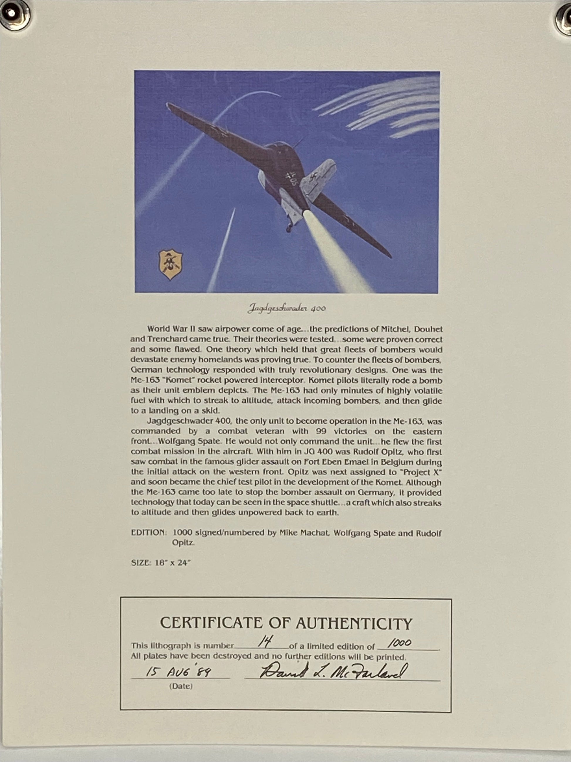 A certificate of authenticity featuring a picture of the Jagdgeschwader 400, Messerschmitt ME-163 Komet by Mike Machet, signed by Wolfgang Spate and Rudolf Opitz
