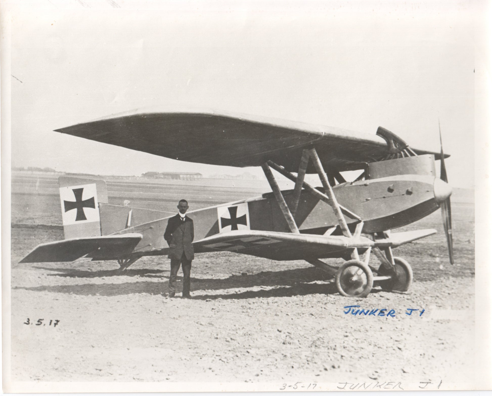 Vintage photograph of the Junkers J1 biplane with a pilot standing beside it. - Image: Folder16-3