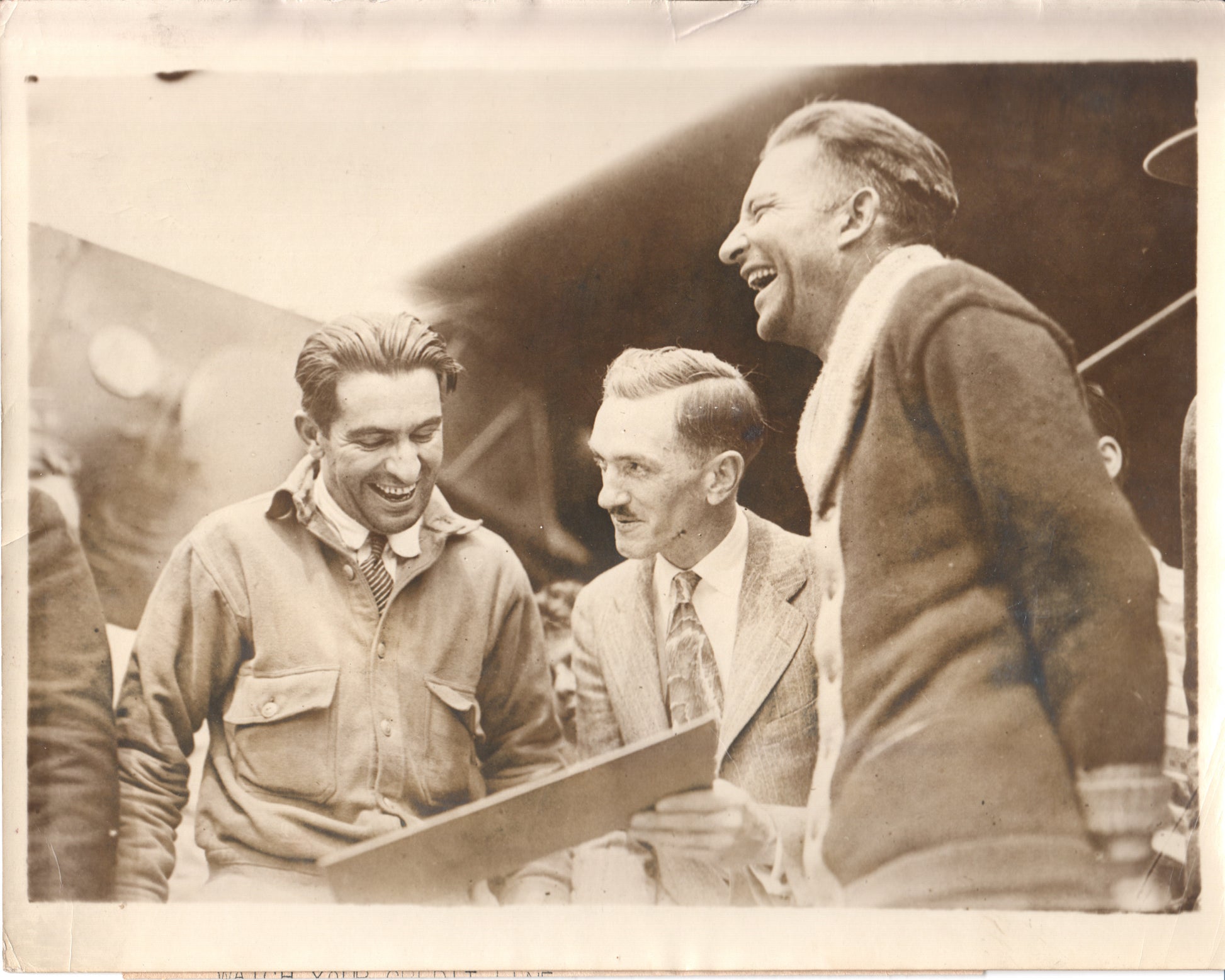 Vintage photograph of aviators smiling together in the 1930s. - Image: Folder19-12