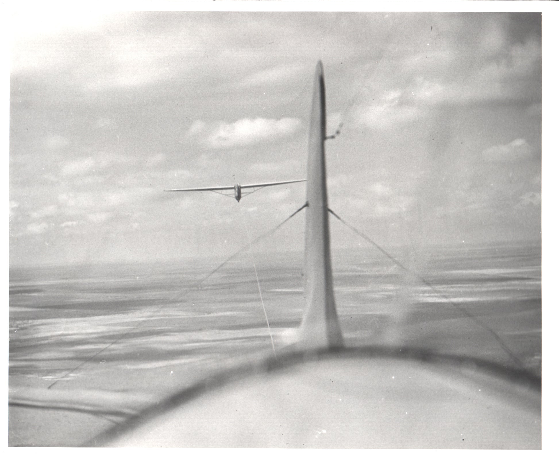 Vintage aerial photograph featuring a glider being towed. - Image: Folder20-21