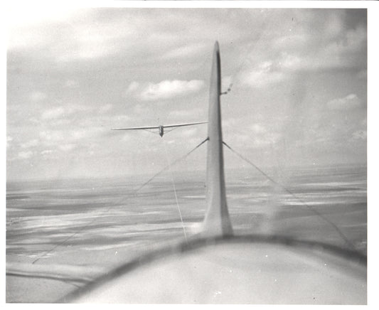 Vintage aerial photograph featuring a glider being towed. - Image: Folder20-21