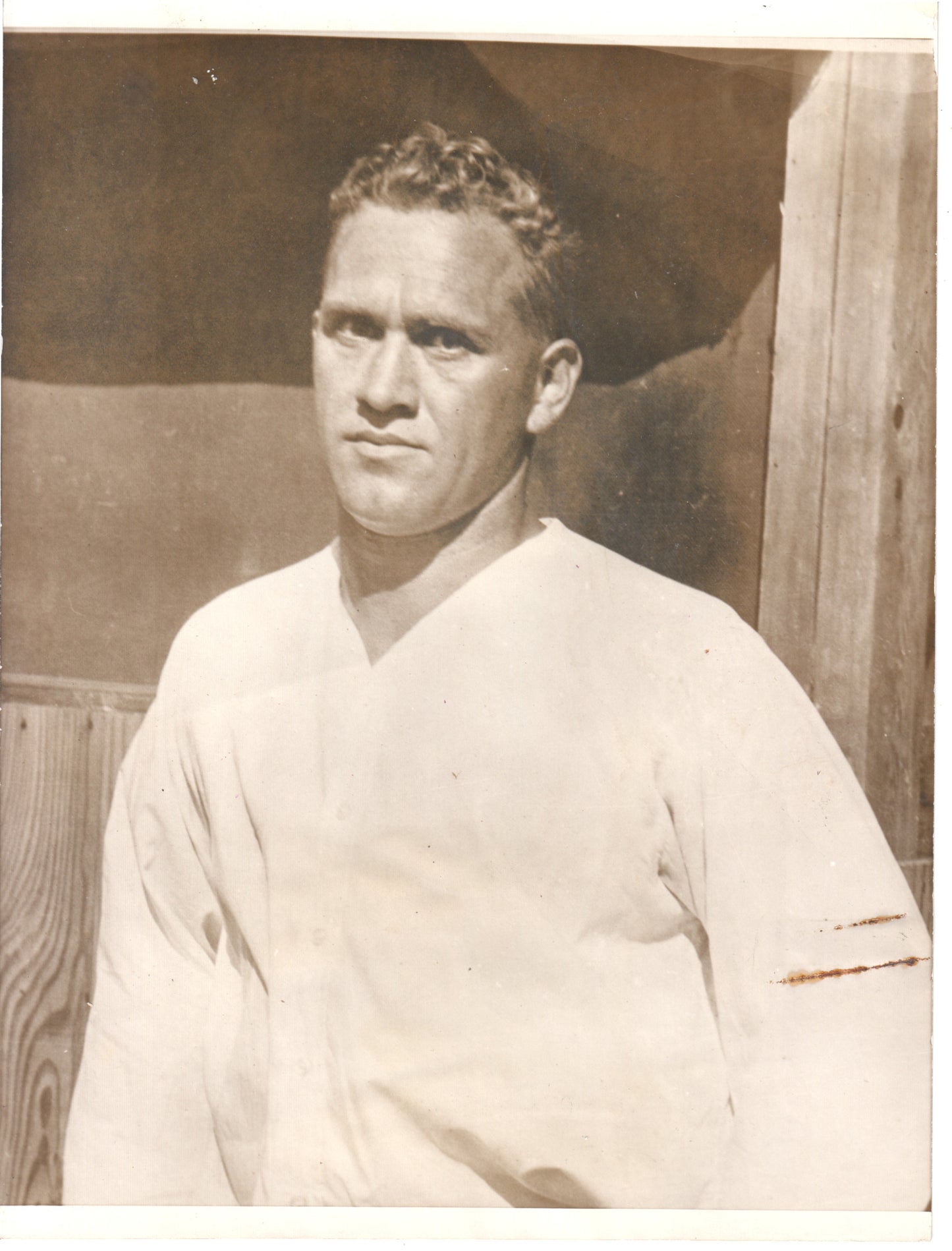 Vintage black and white portrait of a strongman in a white athletic shirt. - Image: Folder27-19