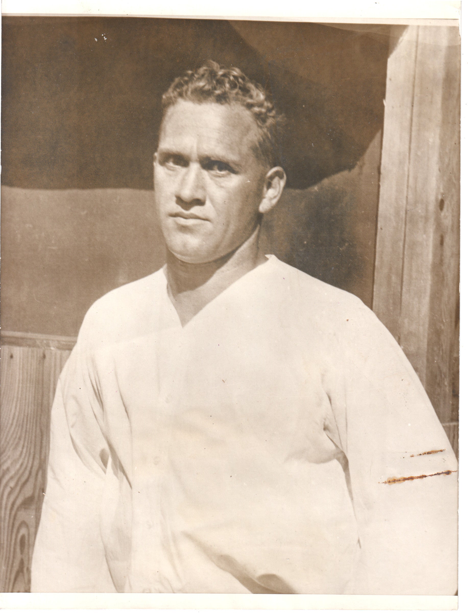 Vintage black and white portrait of a strongman in a white athletic shirt. - Image: Folder27-19