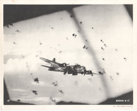 Black and white photo of a Boeing B-17 bomber in the sky - Image: Folder15-12