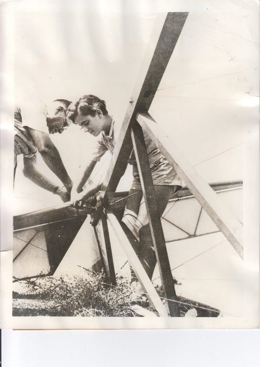 Two young men building a glider in a vintage black and white photograph. - Image: Folder3-19