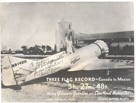 Historic photograph of pilot Earl Ortman beside his airplane, celebrating a record flight. - Image: Folder15-11