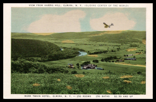 Vintage postcard depicting the view from Harris Hill in Elmira, NY, featuring the Mark Twain Hotel and an airplane. - Image: MA-PC_0047